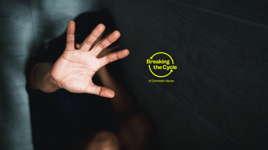 Person holding their hand up saying stop