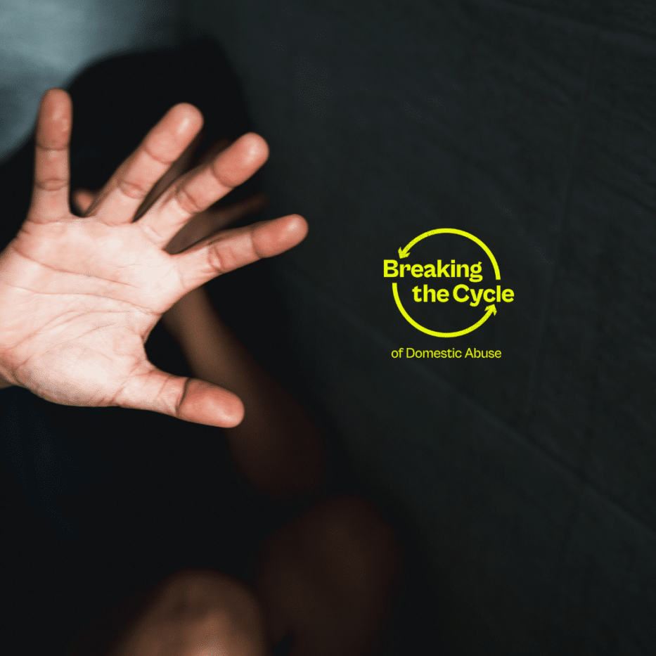 Person holding their hand up saying stop