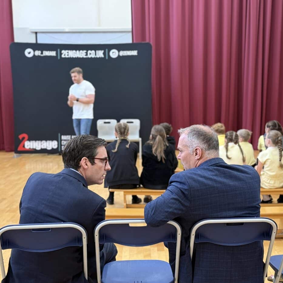 Dan Price sat with Head Teacher at Halton Lodge primary school