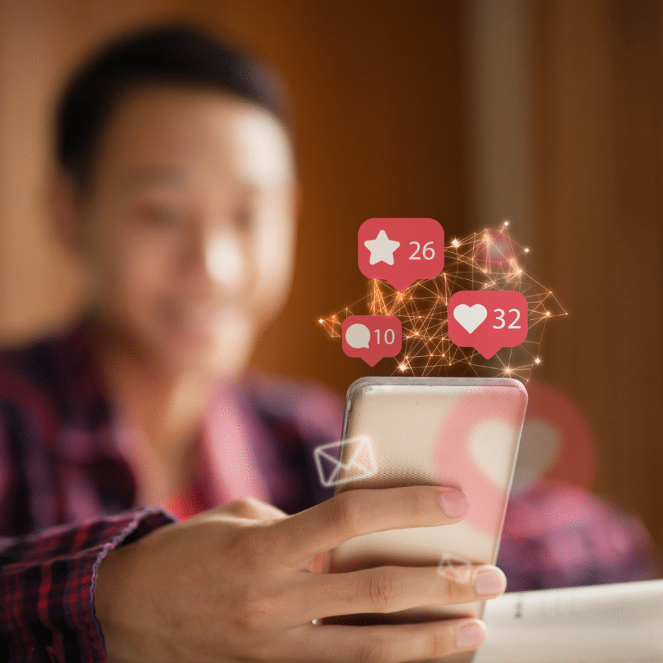 Young person on smart phone looking at apps