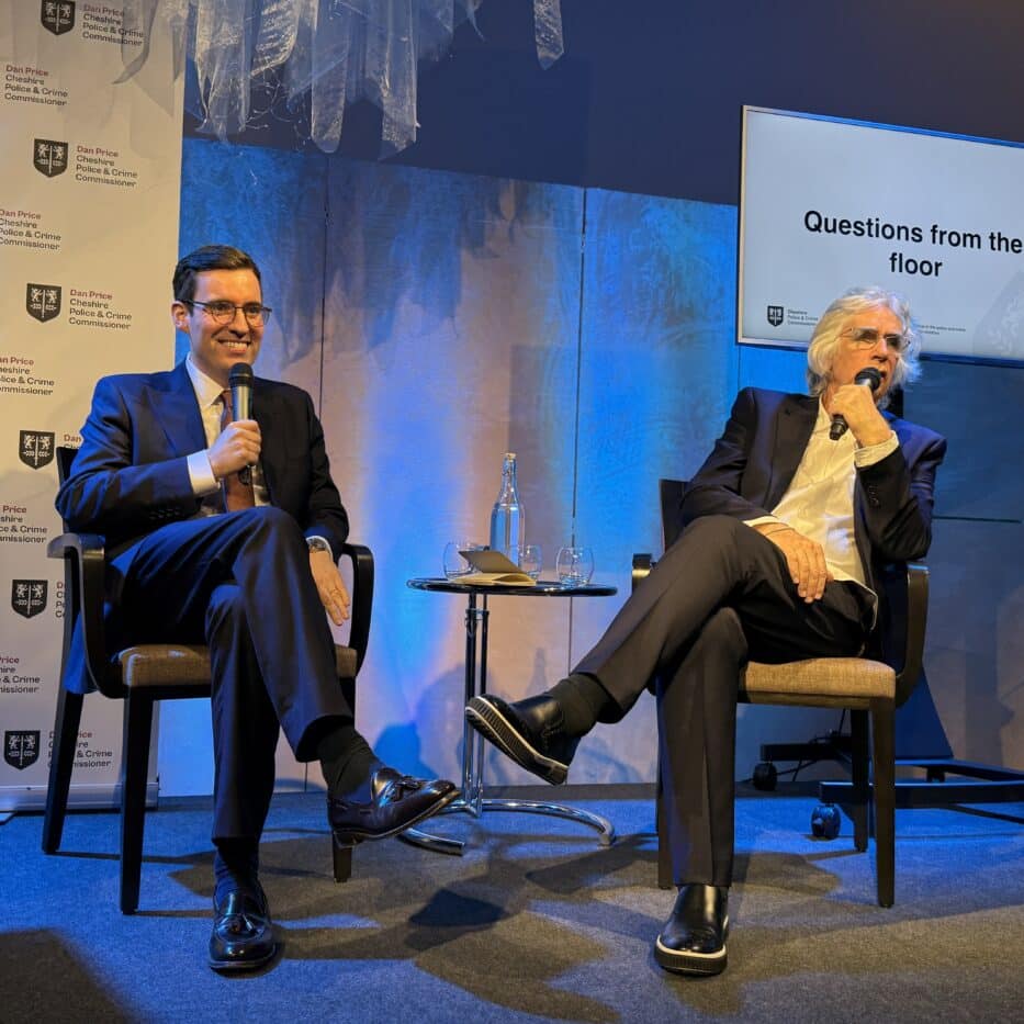 Dan Price and Sir Phil Redmond CBE on stage taking questions