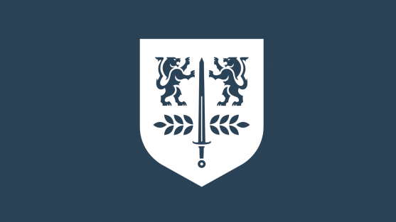 White PCC crest on blue background