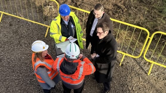 Dan Price with MP Connor Naismith at Crewe police building