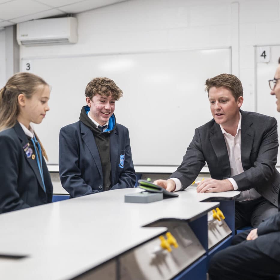 Duke of Westminster with Dan Price and students