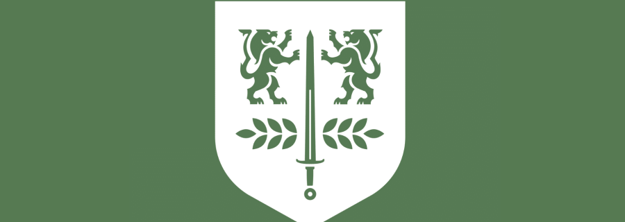 White PCC crest on green background